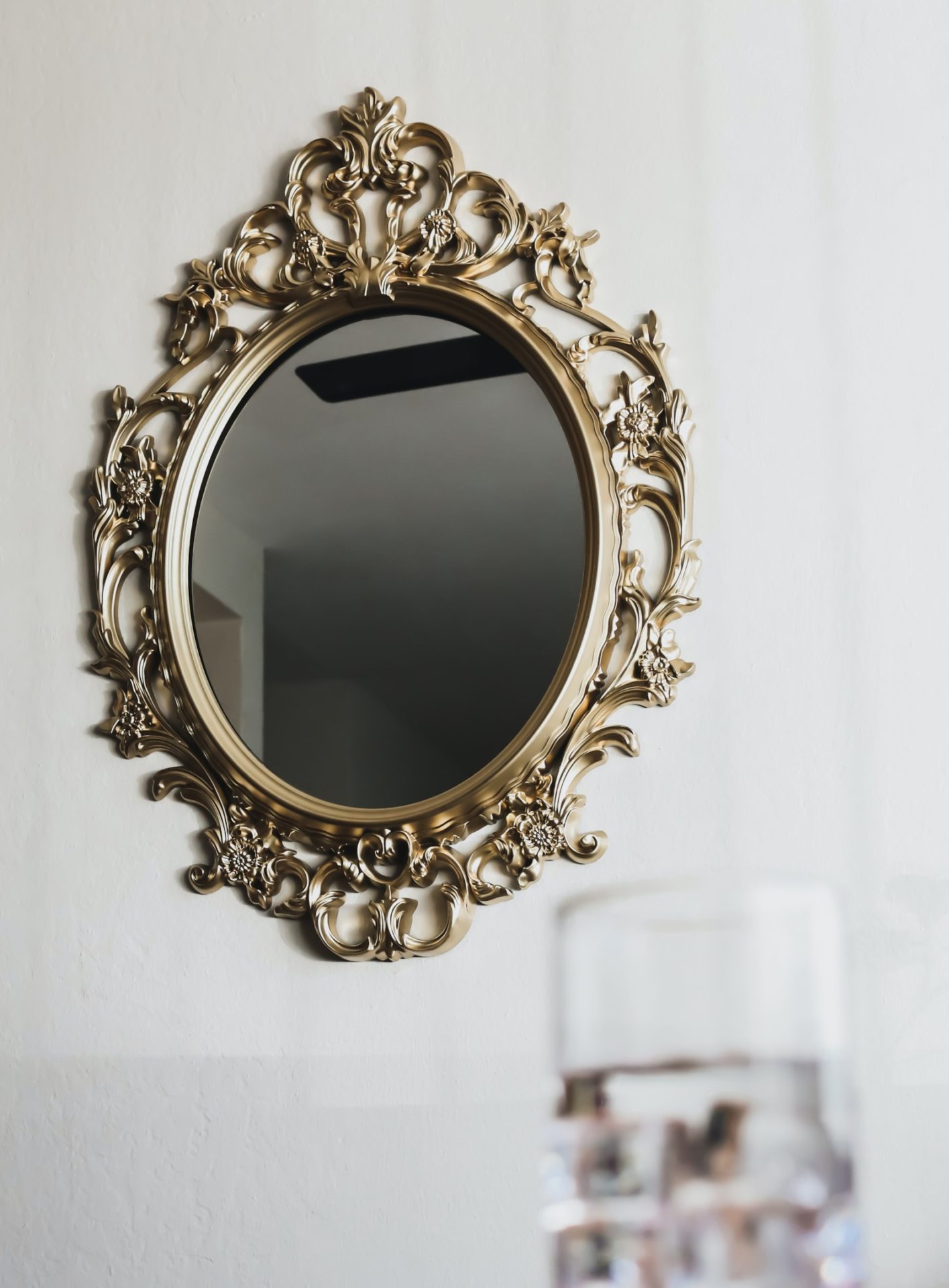 Gold ornate antique mirror