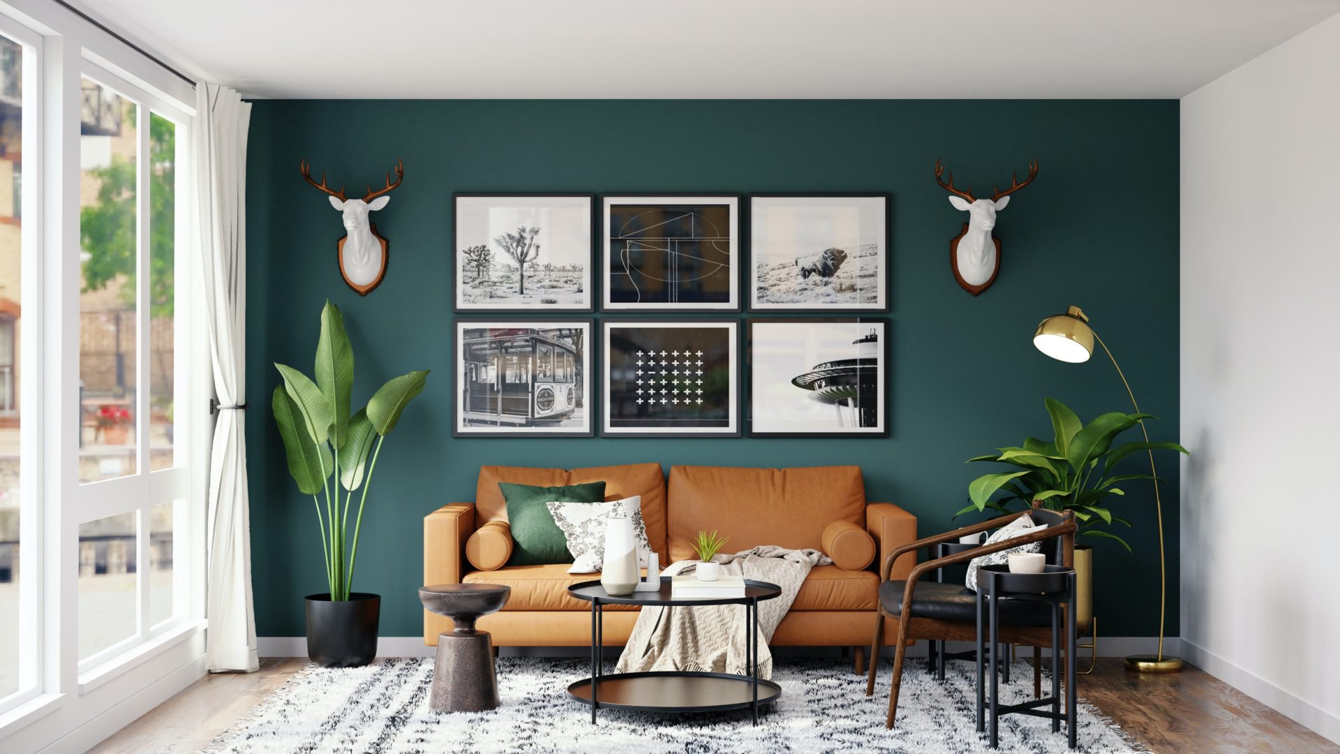 Mid-century modern bohemian living room with jewel tone green accent wall and art