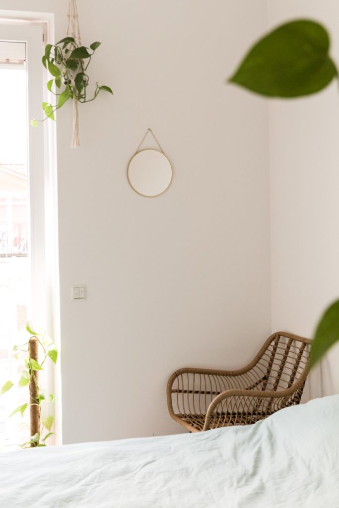 Bedroom with rattan chair