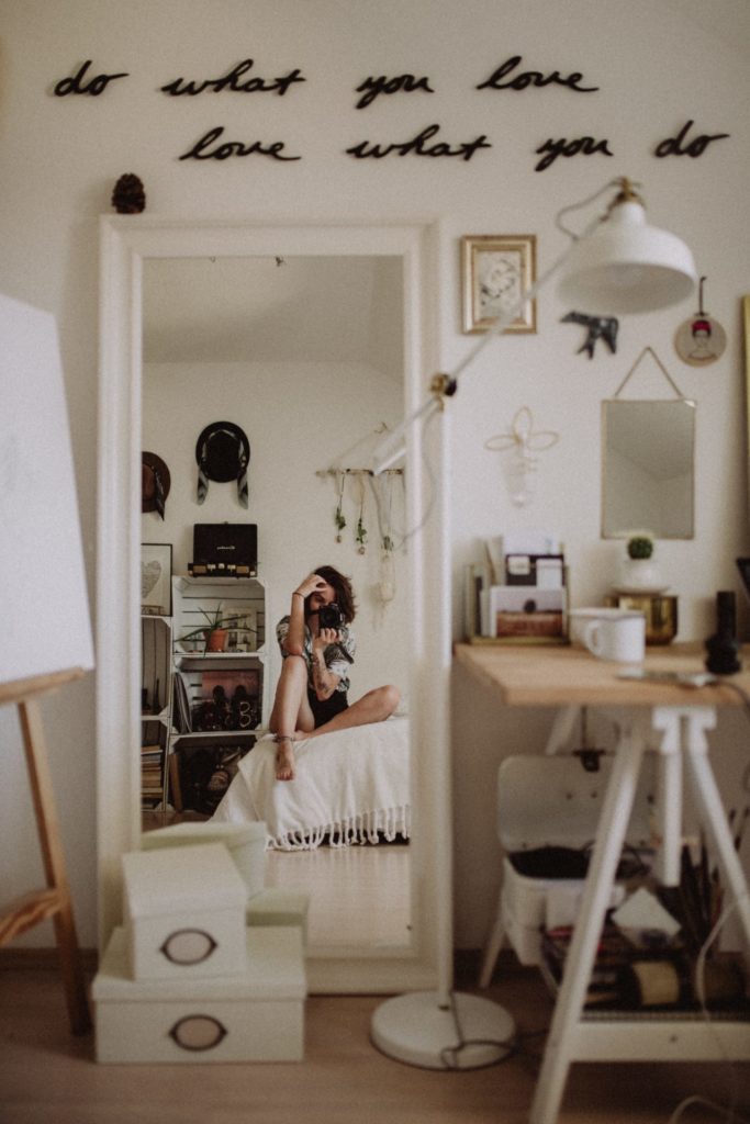 Small Bohemian bedroom with eclectic art