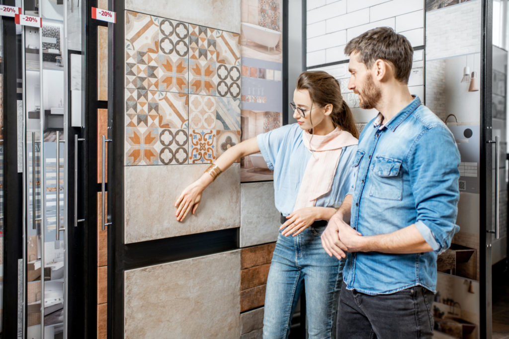 Couple shopping for colorful tiles